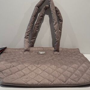 NWT Reebok Quilted Mocha Barbara with inside zipper pocket and long straps.